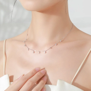 Elegant S925 sterling silver fringe necklace with round cubic zirconia drops on model