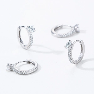 Minimalist S925 sterling silver hoop earrings featuring sparkling round cubic zirconia stones