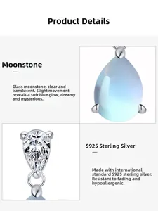 Gros plan des boucles d'oreilles en argent S925 avec pierre de lune et zircons