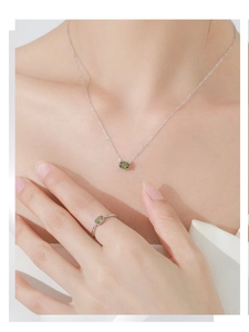 Elegant model display of S925 silver set with oval green gemstone necklace and ring