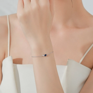 S925 sterling silver minimalist chain bracelet with round blue and pear cut white gems
