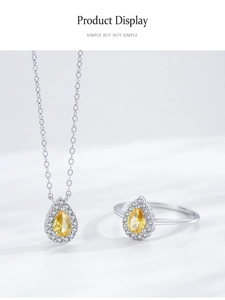 Detail view of pear-cut yellow diamond jewelry set in S925 sterling silver