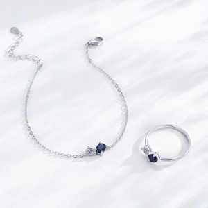 Elegant S925 sterling silver jewelry set with blue oval stones and heart cubic zirconia