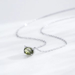 Elegant S925 sterling silver necklace with oval olive green pendant on a white background