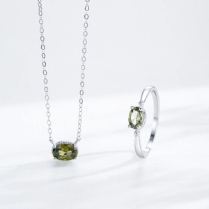 Elegant S925 sterling silver jewelry set featuring oval olive green gemstones