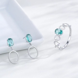 Elegant S925 sterling silver jewelry set featuring oval blue-green paraiba gems and rings