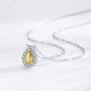 Elegant S925 silver necklace with pear-shaped yellow gemstone pendant and diamond halo