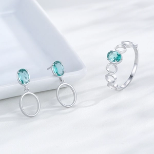 Ensemble en argent S925 avec pierres Paraiba bleues ovales incluant bague et boucles
