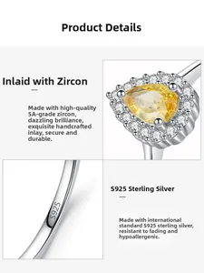 Macro detail of S925 sterling silver stamp and pear-cut yellow cubic zirconia setting