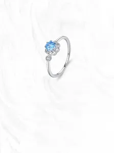 Detailed view of S925 sterling silver ring featuring a blue crystal flower design