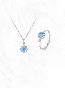 Detailed view of S925 sterling silver set with sea blue flower shaped crystals