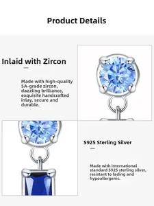 Detail of S925 sterling silver earrings with sapphire blue stones and 5A cubic zirconia