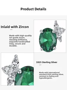 Détails macro de la boucle d'oreille S925 argent, zircon émeraude et sertissage papillon 5A