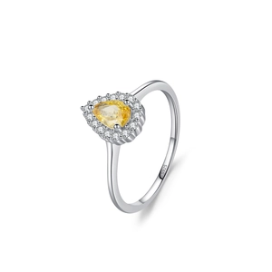 S925 Sterling silver ring with pear-cut yellow diamond and halo setting from a side view