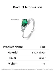 Macro view of S925 silver ring featuring 6x8mm emerald-green oval zircon with side diamonds
