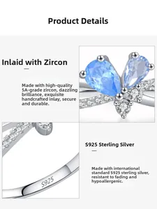 Macro shot showing S925 sterling silver stamp and blue zircon inlay details of the ring
