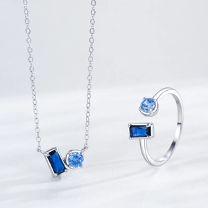 Parure élégante en argent S925 avec zircons géométriques bleus sur bague et collier