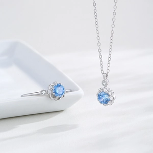Elegant S925 silver jewelry set with blue flower pendant necklace and matching ring