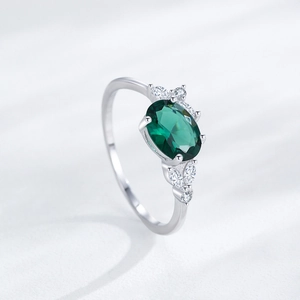 Classic S925 silver ring with oval emerald zircon and elegant floral cluster accents