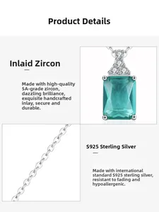 Detail of S925 sterling silver necklace with emerald-cut blue zircon and diamonds
