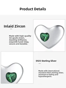Detailed macro view of S925 sterling silver heart stud with 5A green cubic zirconia