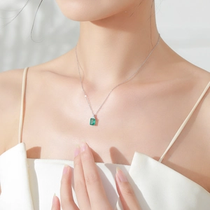 Elegant S925 sterling silver necklace with emerald-cut water blue square pendant for women
