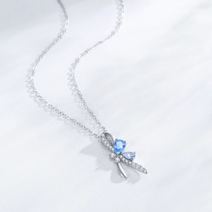 S925 sterling silver bow pendant necklace with sparkling blue gemstones and fine chain