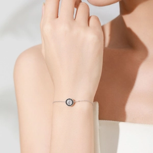Elegant S925 sterling silver chain bracelet with black and white zircon circular pendant