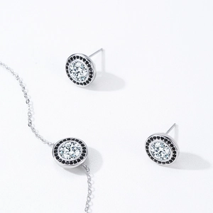 Classic S925 silver jewelry set featuring halo round earrings and a matching bracelet