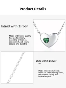 Macro shot of S925 sterling silver heart pendant necklace with green 5A zircon stone
