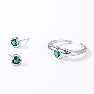 S925 silver jewelry set with green heart-shaped emerald stones on ring and stud earrings