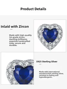 Macro detail of S925 sterling silver heart earrings with 5A blue cubic zirconia inlay
