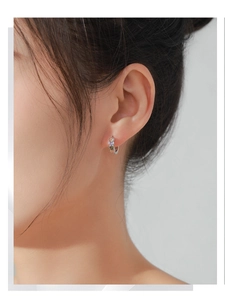 Detail view of S925 sterling silver hoop earrings with colorful romantic heart motifs