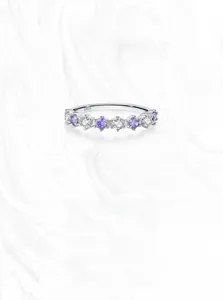 Detail of S925 sterling silver ring featuring purple and white round-cut zircon stones