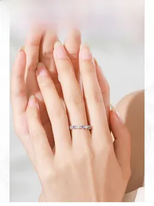 Detail of S925 silver ring featuring alternating purple amethysts and white zircons