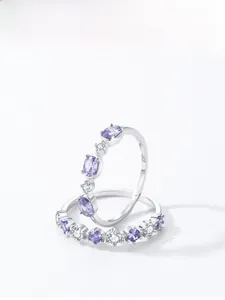 Detailed close-up of S925 sterling silver rings set with purple zircon gemstones