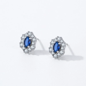 Elegant 925 sterling silver sapphire stud earrings with oval cut halo diamonds