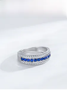 Macro shot of S925 sterling silver stamp and three-row blue and white zircon inlay