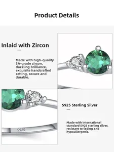 Close-up of S925 sterling silver stamp and round emerald green zircon on the ring band