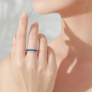 925 silver triple row ring with blue and white zircon stones worn on finger