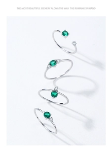 Detailed view of S925 sterling silver geometric rings set with green zircon stones
