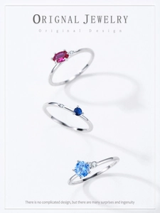 Detailed view of S925 silver rings with colorful oval zircon gems and side diamond accents