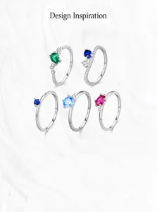 Detail of five S925 sterling silver rings with colorful gemstones and S925 engravings