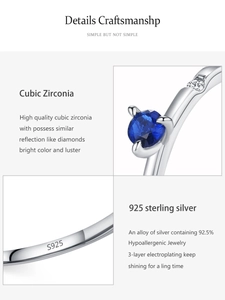 Detail of S925 sterling silver ring with blue cubic zirconia and 3-layer plating
