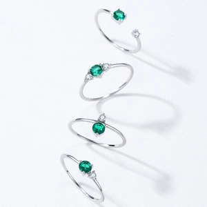Minimalist 925 sterling silver ring set featuring emerald green zircon stones for women