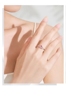 Macro detail of S925 silver ring featuring pink marquise and red round zircon gemstones