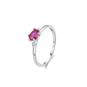 925 sterling silver ring with oval pink gemstone and subtle side zircon accent