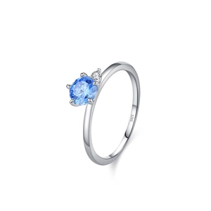 Anello minimalista in argento S925 con uno zircone blu rotondo incastonato a quattro griffe