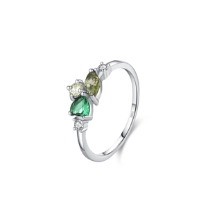 Vintage 925 sterling silver ring featuring green teardrop zircon and asymmetrical stones