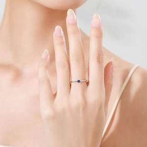 Minimalist S925 sterling silver ring with round sapphire and small side diamonds